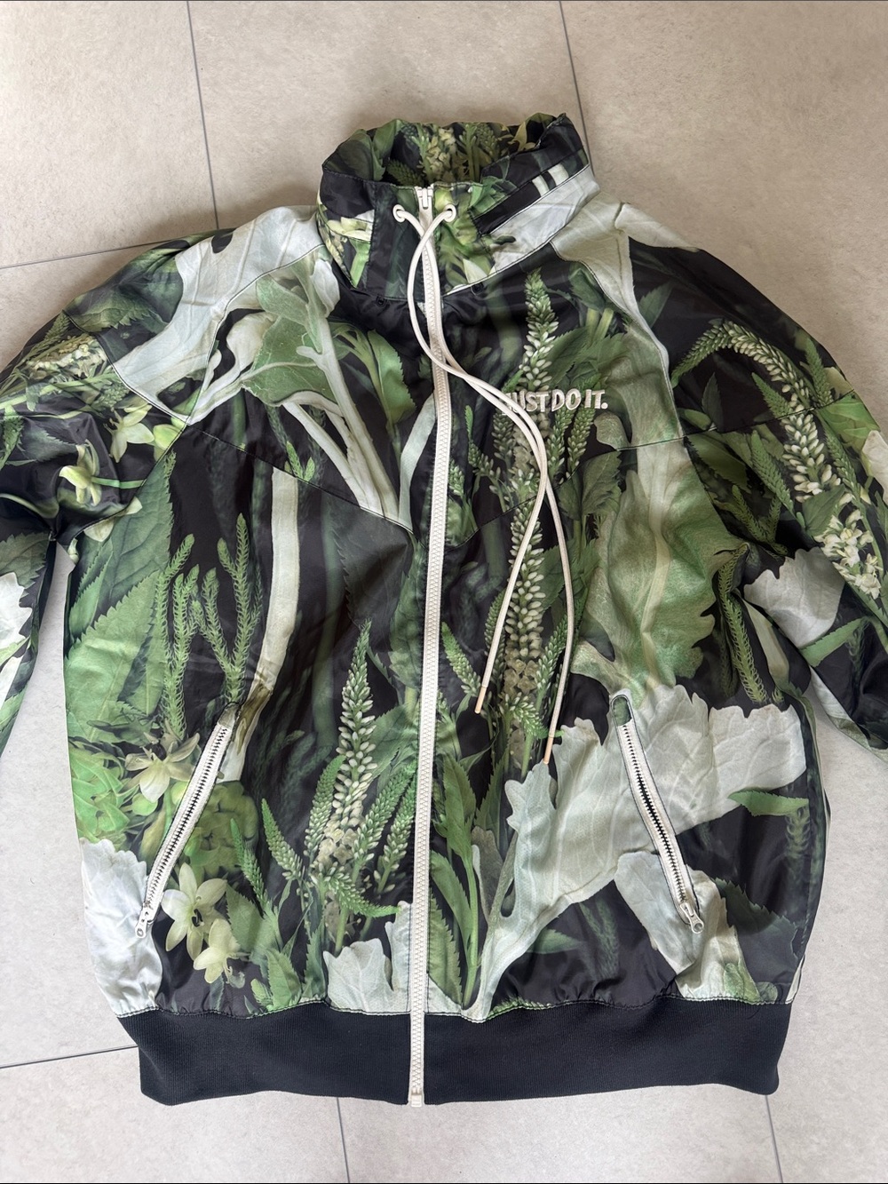 Nike- camouflage like windbreaker